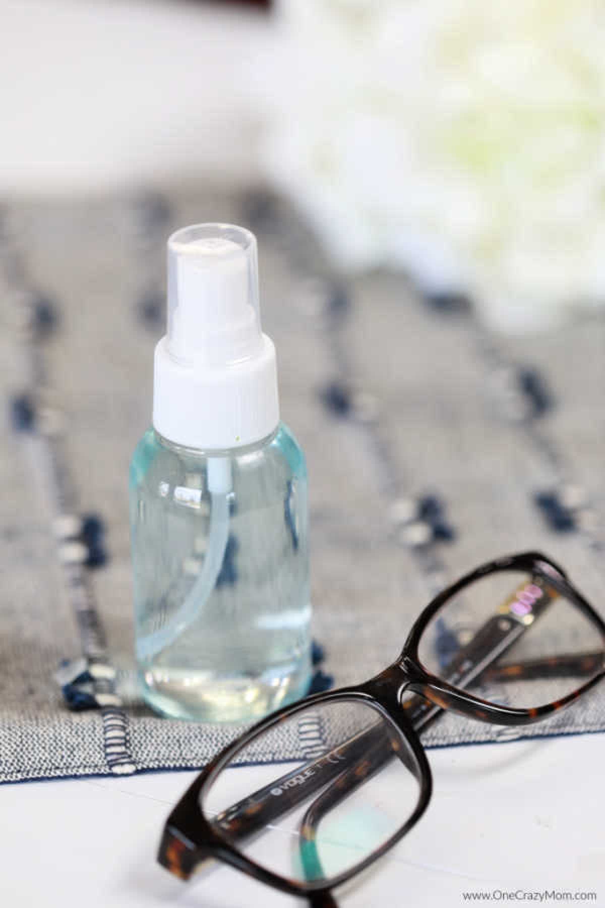 Homemade Eyeglass Cleaner is so simple to make and very budget friendly. Make this easy diy eyeglass cleaner today and see how great it works! Spray bottle of glass cleaner and eyeglasses.