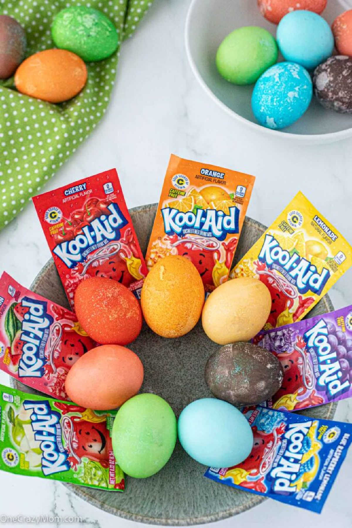 Kool Aid dyed eggs in a basket.