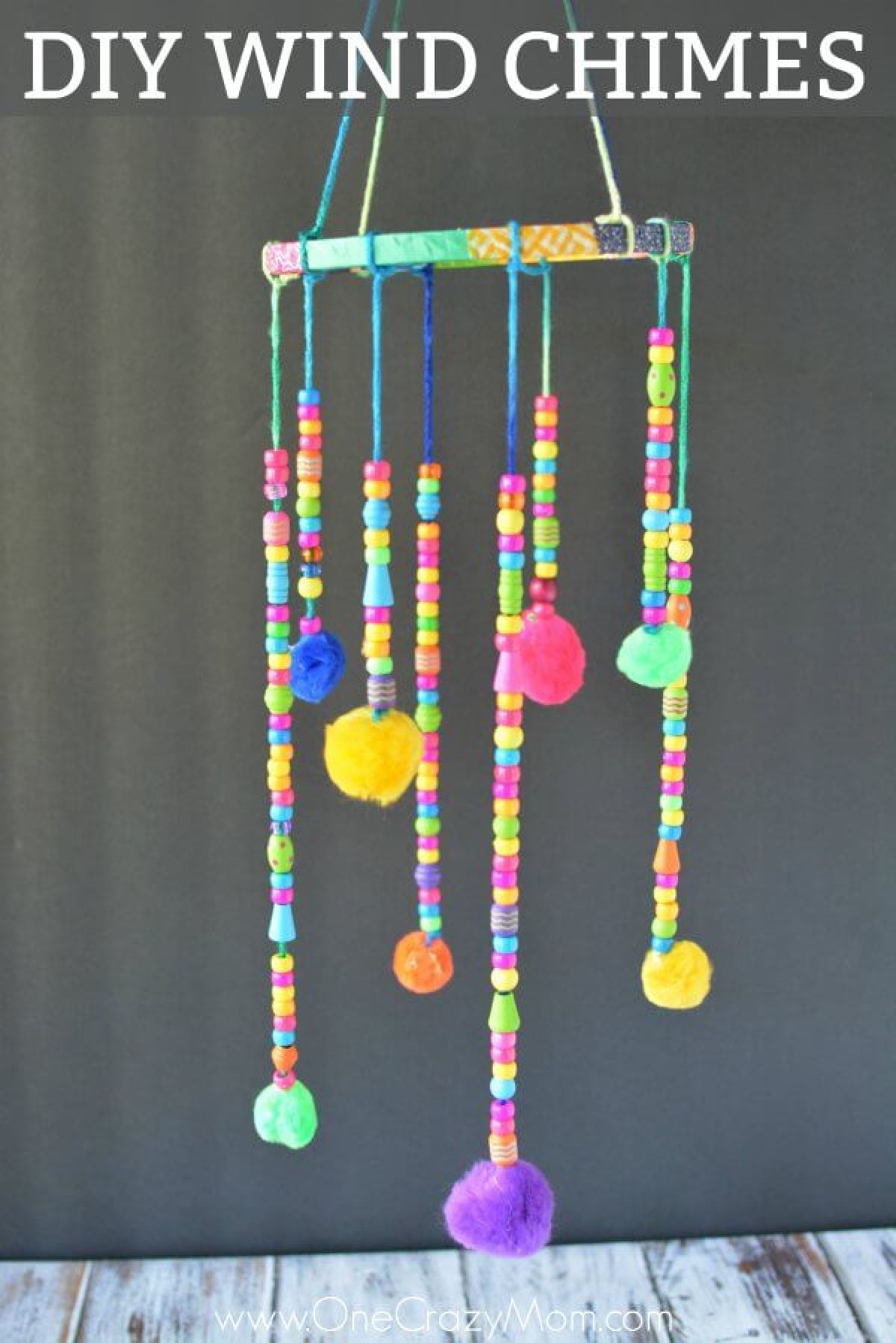 DIY wind chimes are really simple to make. Learn how to make wind chimes. It's so simple and easy. Everyone will have a blast making these pretty wind chimes. DIY Wind Chimes hanging.