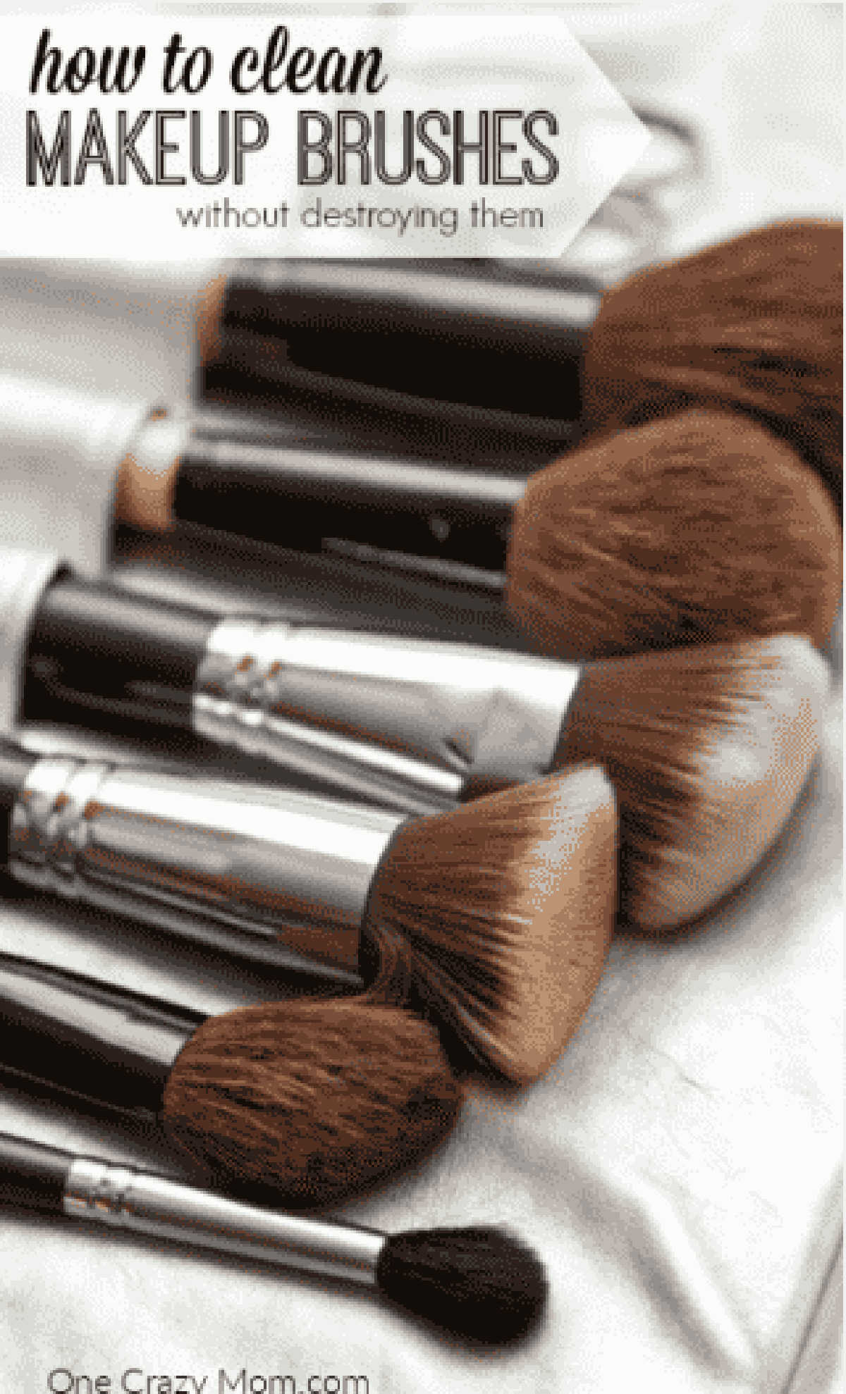 Makeup brushes on a towel.