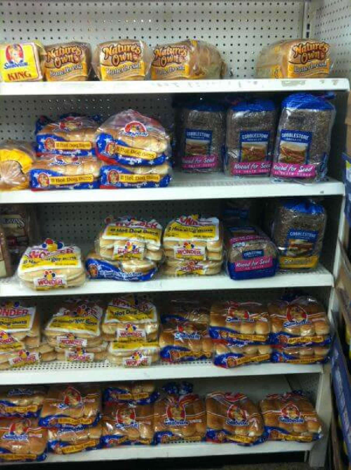 Find out the best things to buy at Dollar Tree store. Find the top 21 items here to buy that will save you cash at Dollar Tree store. Lots of great ideas! Bread on shelves.