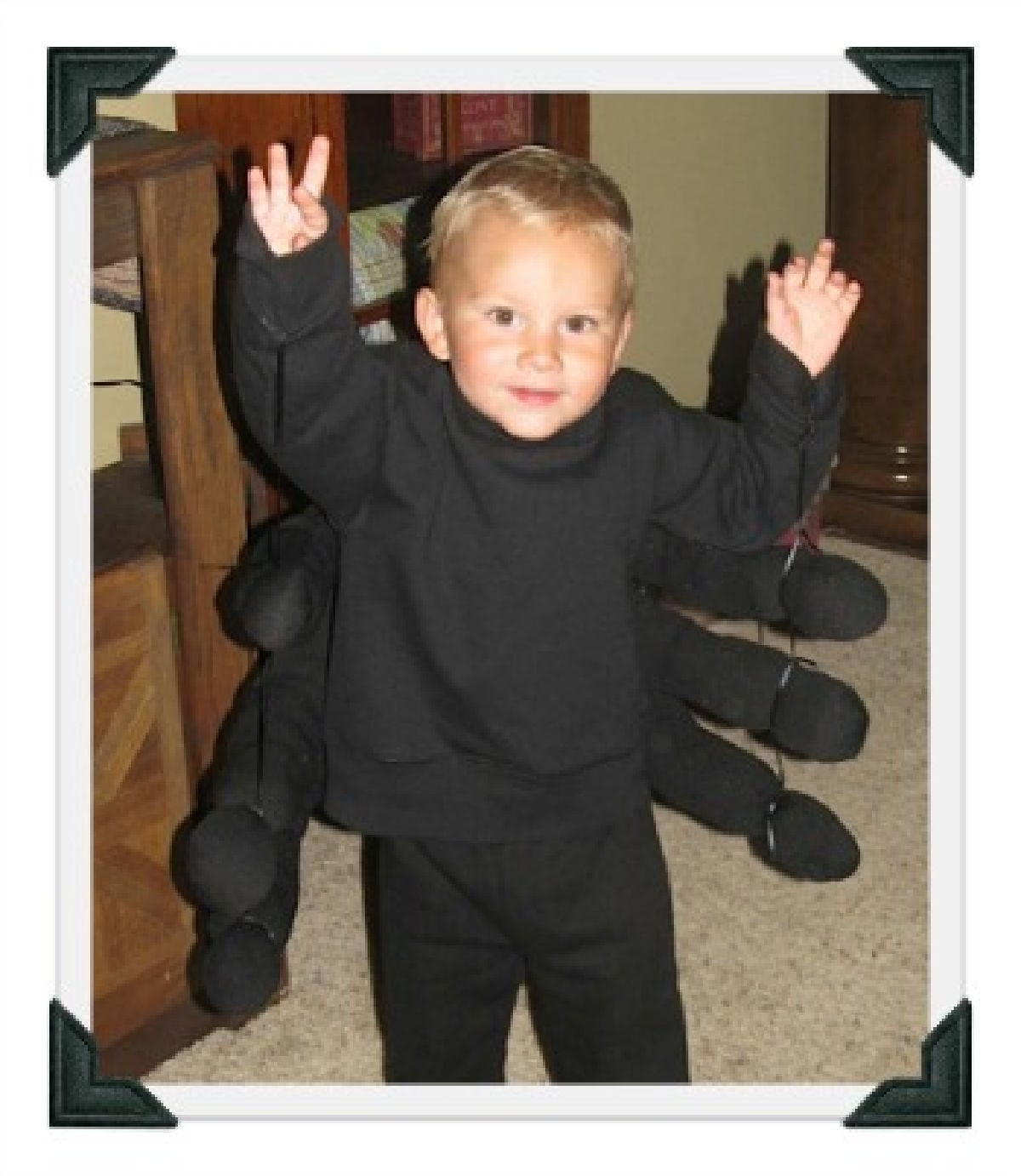 Child in spider costume.