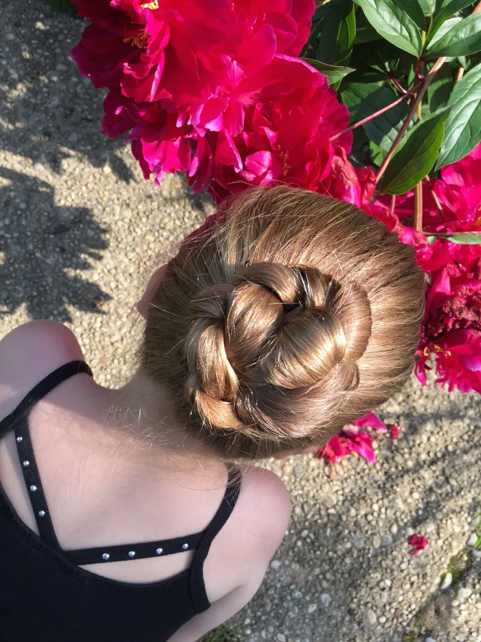 Ballerina bun on child.