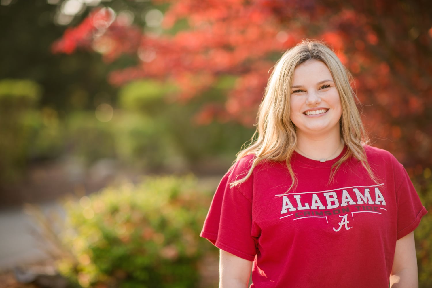 Girl wearing Alabama shirt.